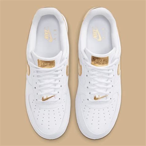 nike air force gold nike zeichen|nike air force 1 low metallic.